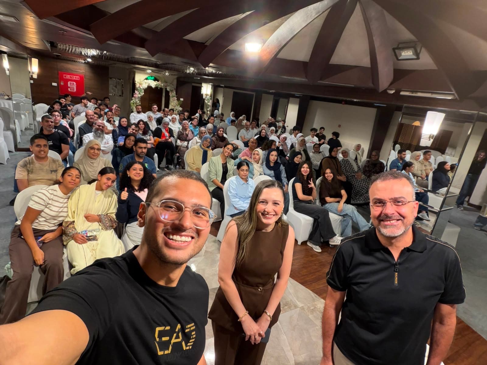 Saif Atef with students and educators at a tour gathering